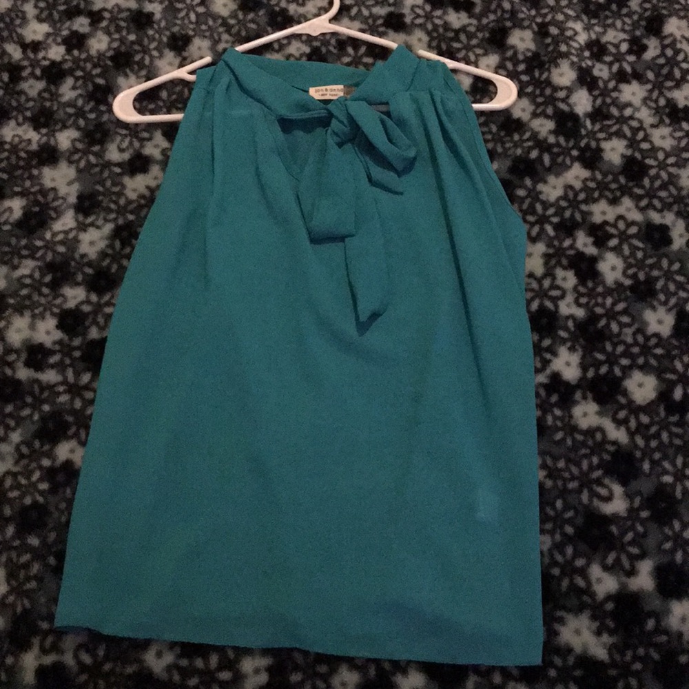 Sheer turquoise top with tie at the front